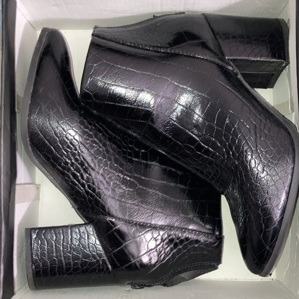 Fairly new black leather booties.